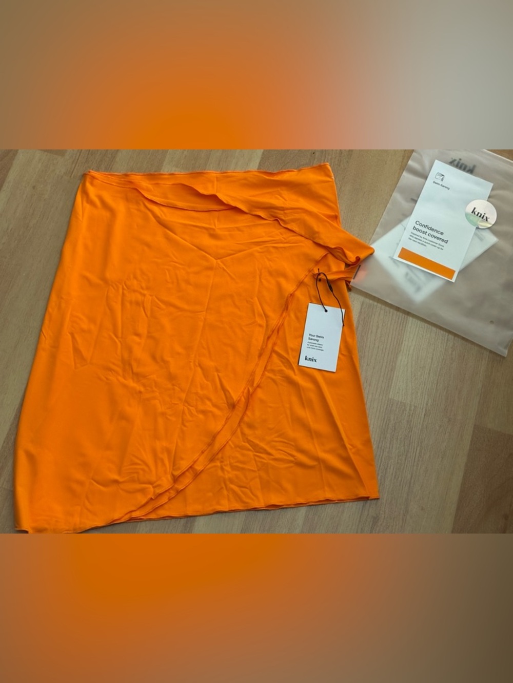 knix mandarin Orange Swim Sarong